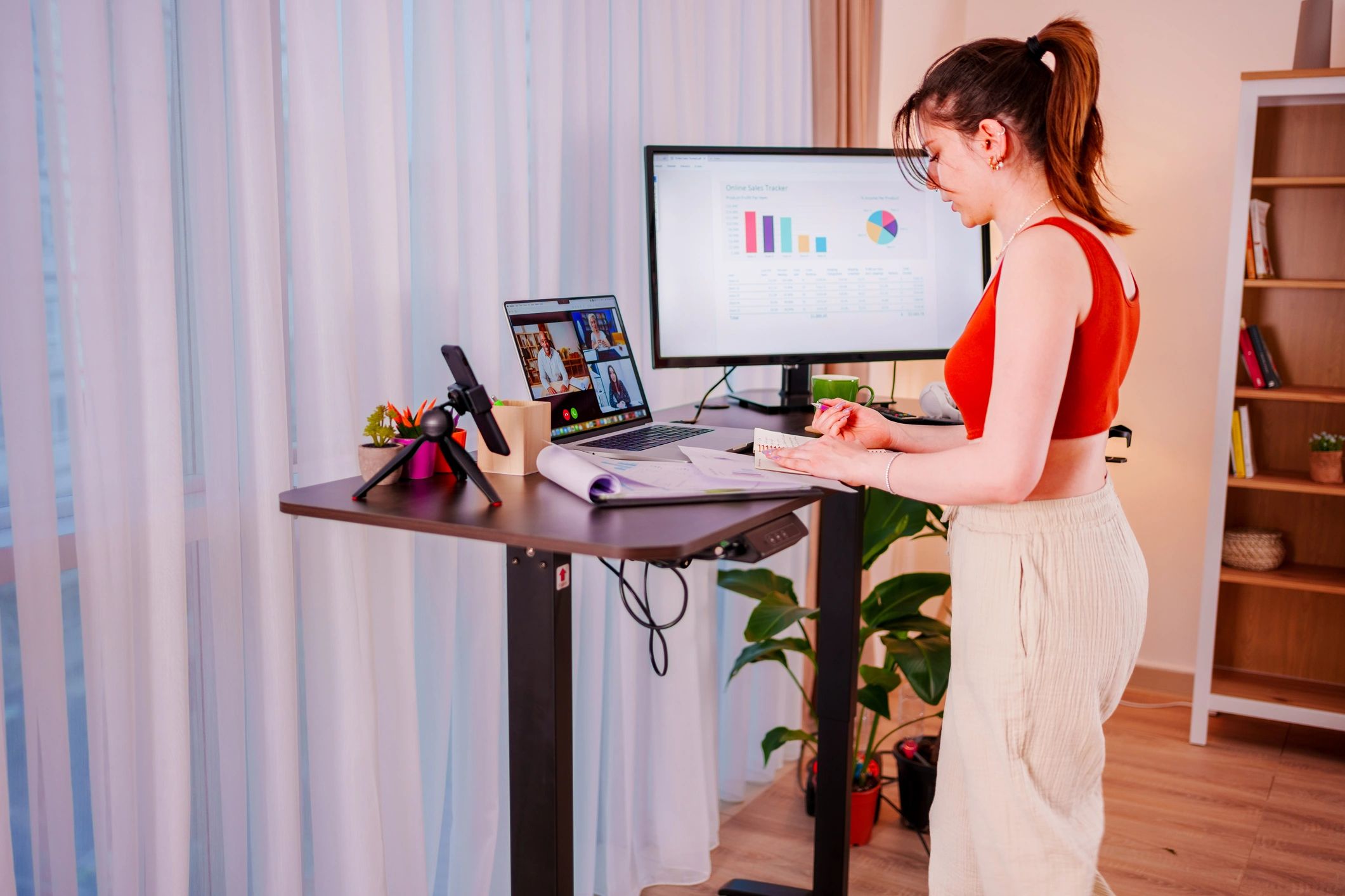 Professional working with business technology at a desk